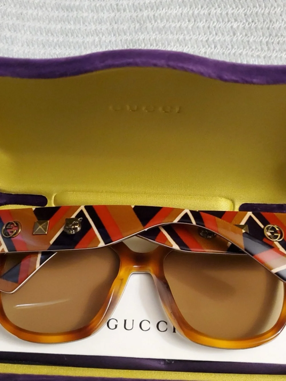 Gucci Women's red tortoise Cat-Eye Sunglasses